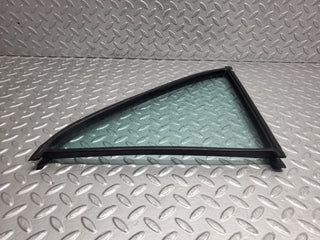 W123 rear left quarter window glass used OEM