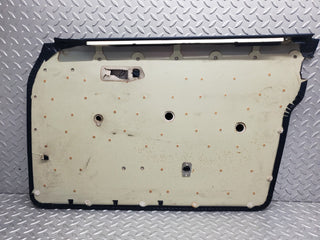 W123 front left door card blue used OEM