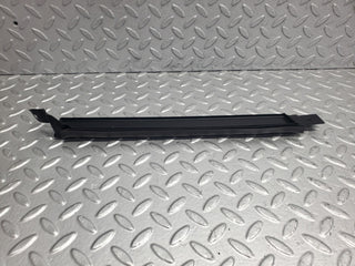 W124 Wagon under headlight trim right side used OEM