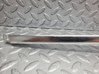 W123 rear right door chrome window channel used OEM