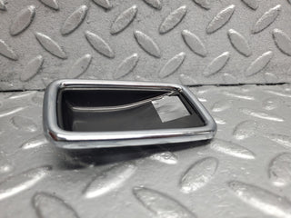 W123 chrome frame door opener left used OEM
