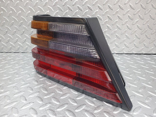 W124 tail light left side used OEM