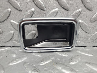 W123 chrome frame door opener right used OEM