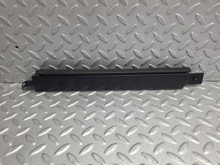 W124 Wagon under headlight trim right side used OEM