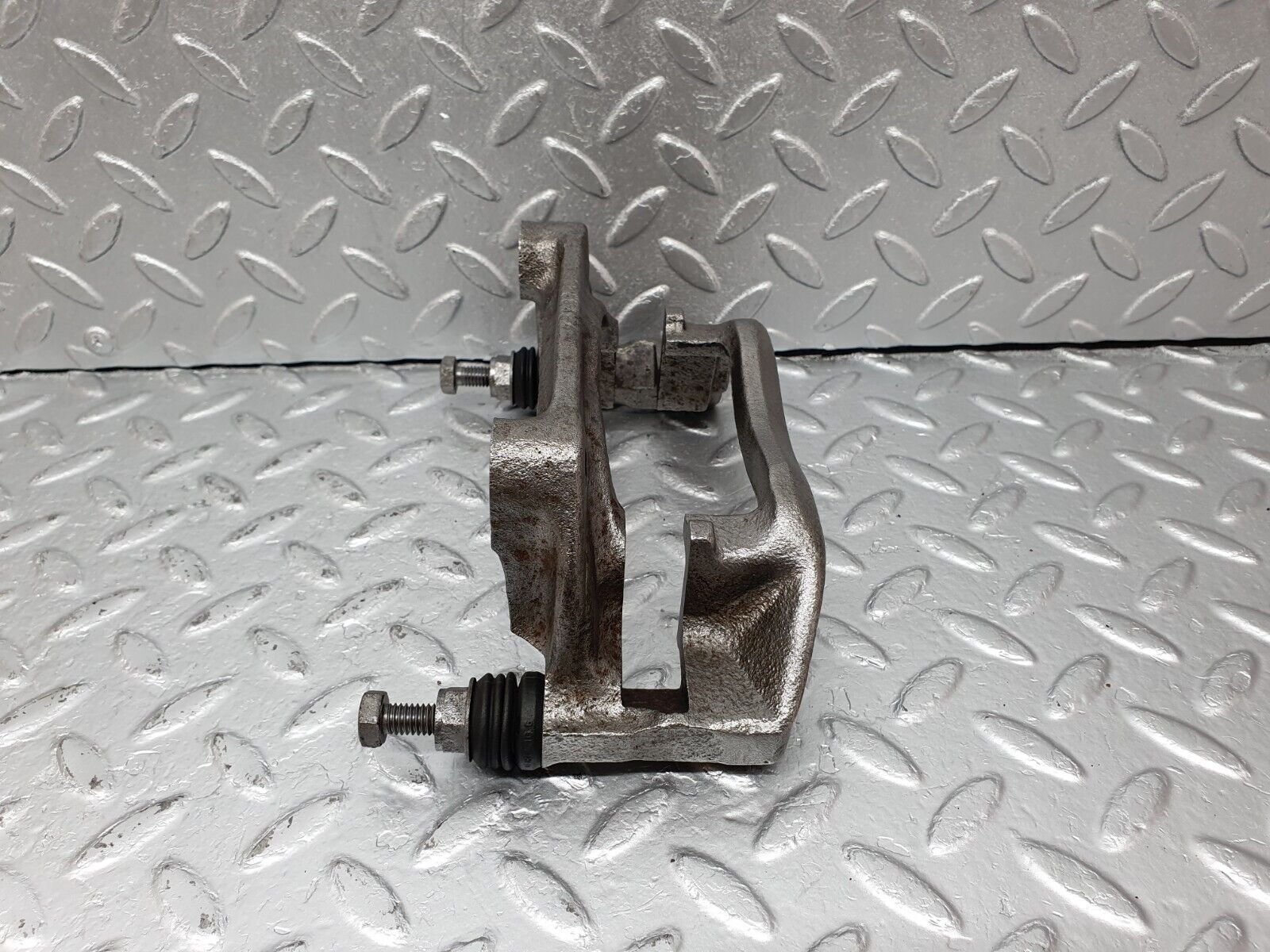 41611 Mercedes-Benz W124 200E Front Right Brake Caliper Bracket