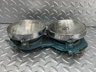W111 headlight left/right used OEM