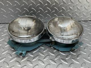 W111 headlight left/right used OEM