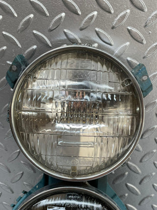 W111 headlight left/right used OEM