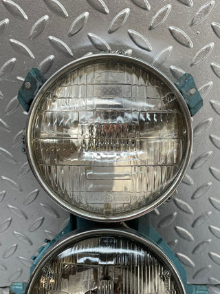 W111 headlight left/right used OEM