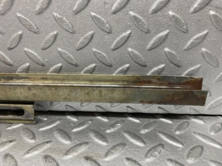 W109 front right door glass holder used OEM