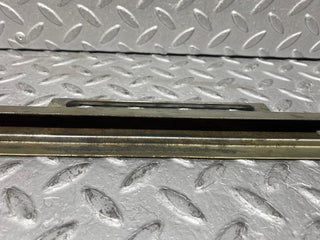 W109 front right door glass holder used OEM