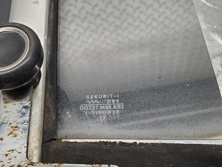 W108 front left quarter window glass used OEM