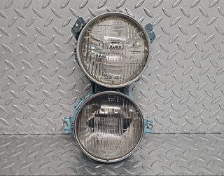 W111 headlight left/right used OEM