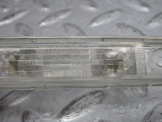 W124 rear license plate light used OEM