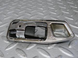 25572 Mercedes-Benz W123 200 Door Handle Surround Left 1167660111