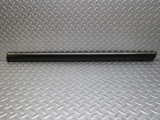 W123 front left door lower trim used OEM
