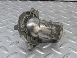 W210 thermostat housing used OEM