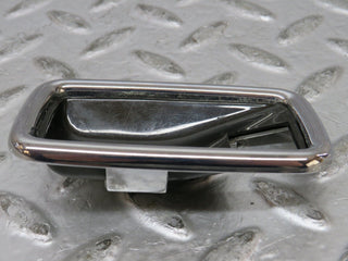 W123 chrome frame for door opener right used OEM