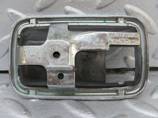 W108 chrome frame for door opener left used OEM