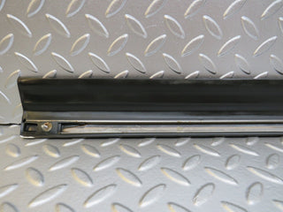 W123 front left door lower trim used OEM