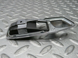 W123 Wagon chrome frame for door opener left used OEM