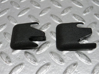 W201 Baby Benz front seat rail trim cover pair used OEM