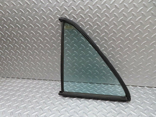 W123 rear left quarter window used OEM