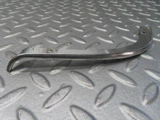 W116 headlight upper chrome fender wing trim pair used OEM
