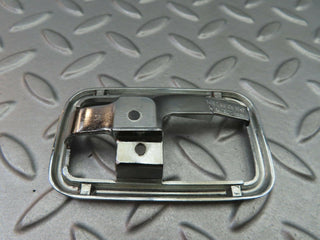 W123 chrome frame for door opener left used OEM