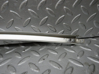 W123 rear right chrome window channel used OEM