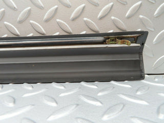 W123 Wagon rear left door lower trim used OEM