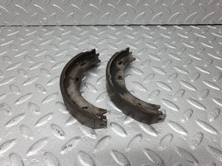 W123 rear brake shoes set right side used OEM