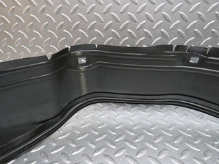 W124 front left inner fender wing splash guard used OEM