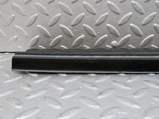 W123 rear right door sill trim black used OEM