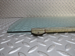 W109 rear right door window glass used OEM