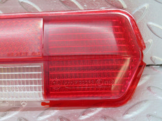 W109 tail light lens left side used OEM