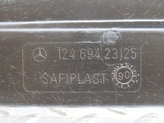 W124 Coupe trunk lock trim panel used OEM