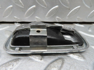 W123 chrome frame for door opener left used OEM