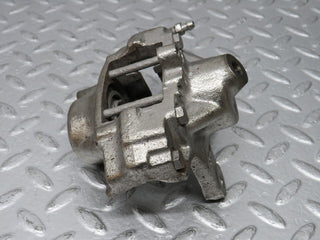 R129 SL rear left brake caliper used OEM