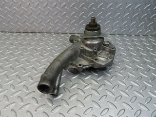 W124 water pump used OEM