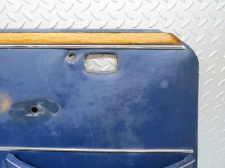 W109 front left door card blue used OEM