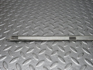 R107 SLC rear left window chrome used OEM