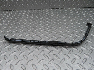 R129 SL right headlight lower trim used OEM