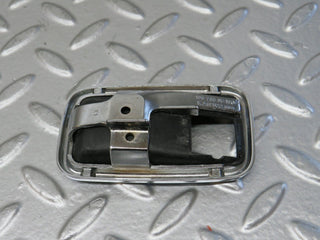W123 chrome frame for door opener left used OEM