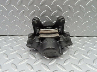 W124 Wagon rear left brake caliper used OEM