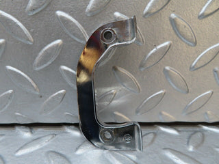 W116 left door interior chrome latch trim used OEM