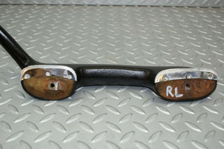 W115 interior door handle rear left black used OEM