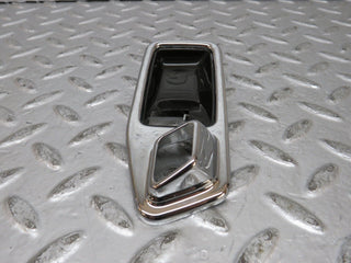 W123 chrome frame door opener rear right used OEM