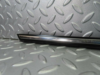 W123 front left door centre moulding trim used OEM