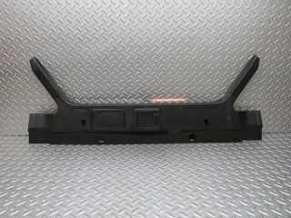 W124 trunk lock trim panel used OEM